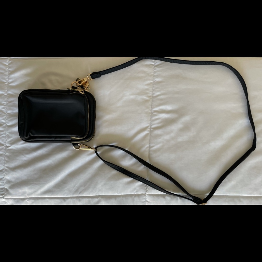 It’s A Simple Black And Gold Crossbody Bag. Gem